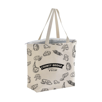 Bags Direct cream County Bridge cooler bag with long matching handles, a white zip closure, visible silver insulated lining and black line drawings of meat cuts, sausages and skewers around a centred logo.