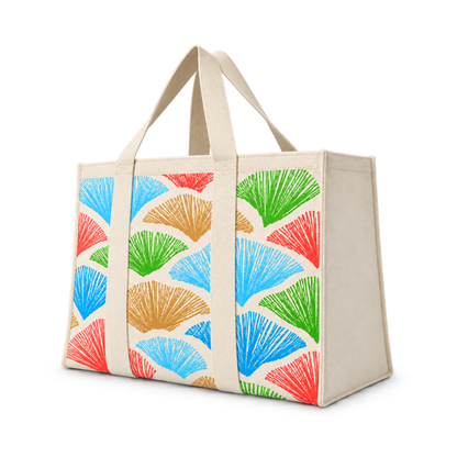 Bags Direct cream tote with matching handles extending down the front, colourful fan-shaped motifs in blue, green, coral and ochre, and plain cream side panels.