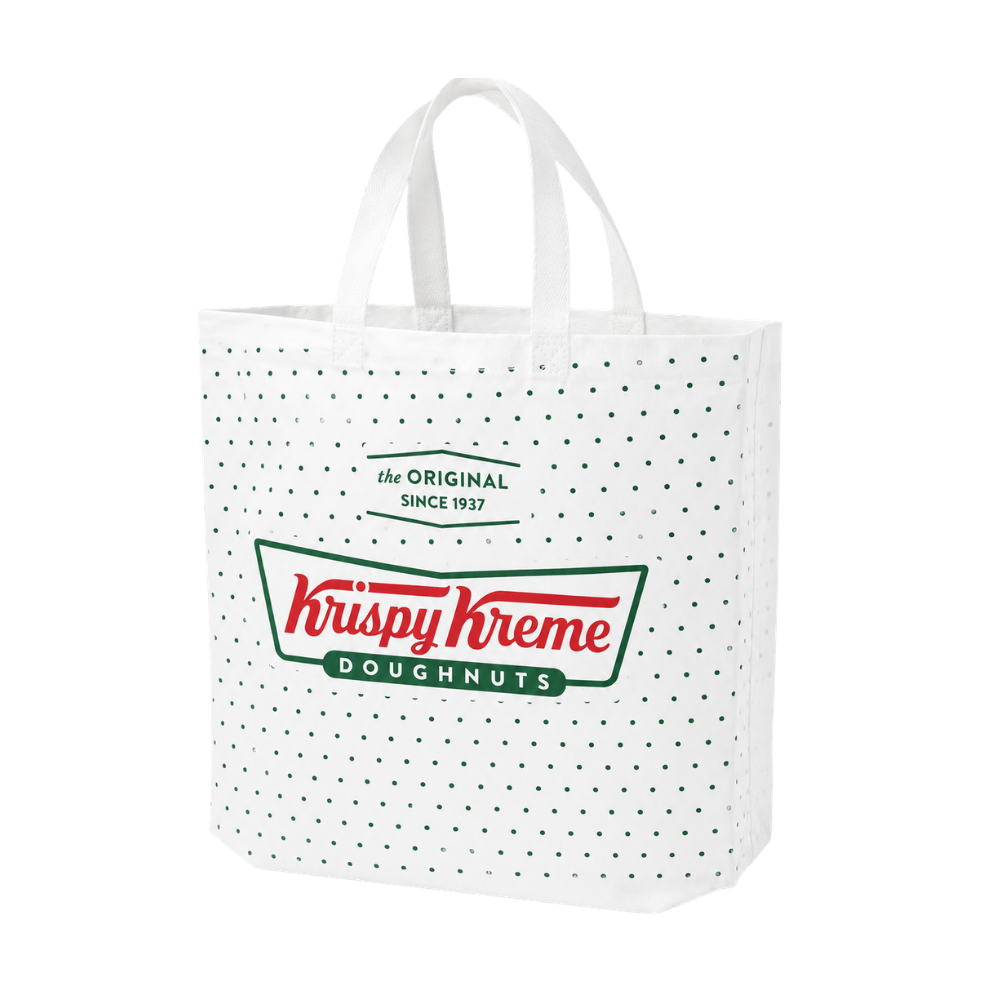 Bags Direct white Krispy Kreme shopper bag with matching handles, small green polka dots, a large red and green doughnuts logo and “The Original Since 1937” lettering.