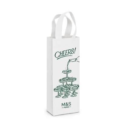 Bags Direct white single wine carrier with matching handles, dark green “Cheers!” lettering, an illustration of a bottle pouring into a champagne glass tower, and the M&S Food logo.