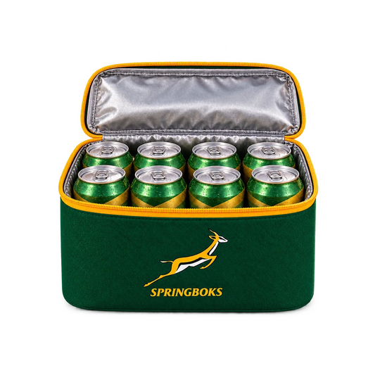 Bags Direct green Springboks lunch cooler with yellow zip trim and an open silver-lined lid, packed with a sandwich, apple, grapes, vegetable sticks and yoghurt.