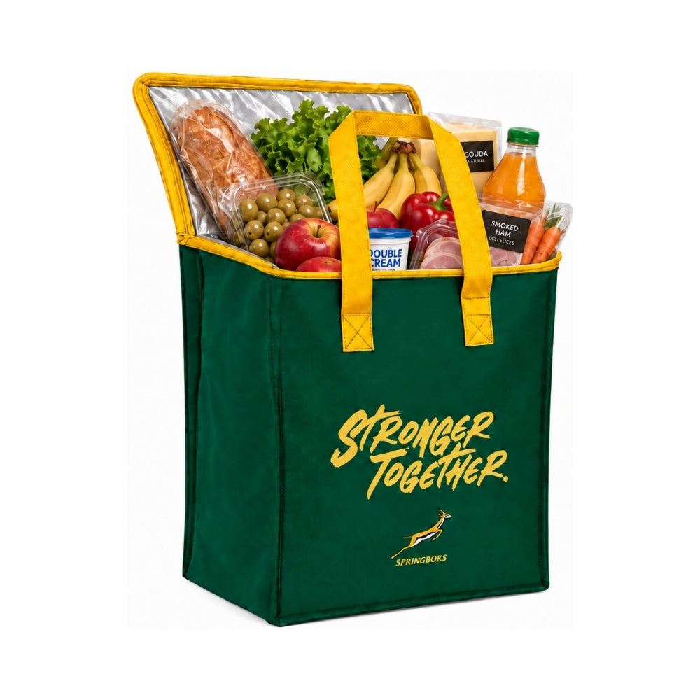 Bags Direct dark green Springboks cooler bag with yellow handles and trim, “Stronger Together” lettering and an open silver-lined lid, filled with bread, fruit, vegetables and chilled groceries.