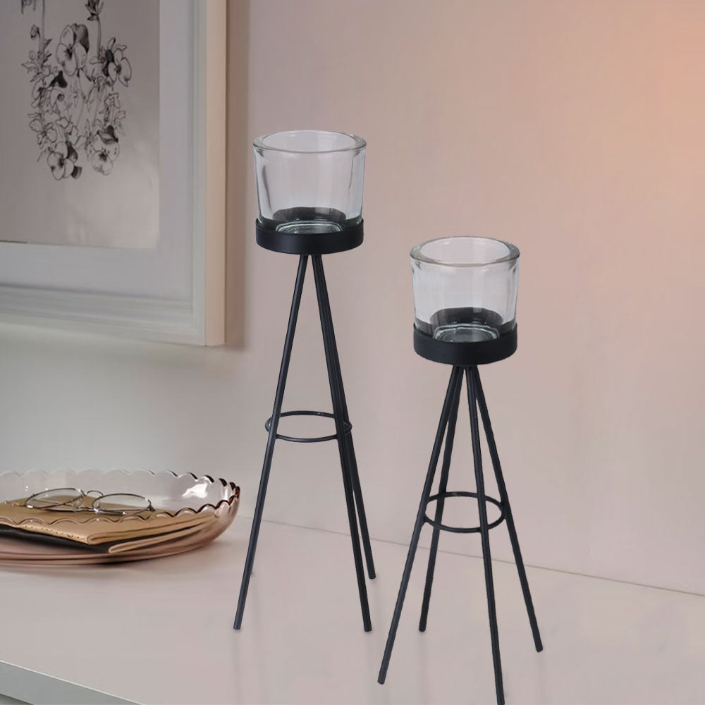 Metal Tealight Candle Holder with Glass - Set of 2 decorative candle holders made out of metal for durability and glass for tealight candles. Make a unique decoration in your home, office or work space. You can any tealight candle inside the glass. Set up light at multiple points in your environment. Bags Direct wholesale online shop CC5056044